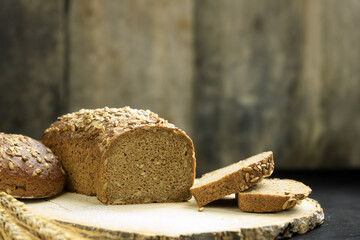 Fresh dark bread. Rye bread on the board