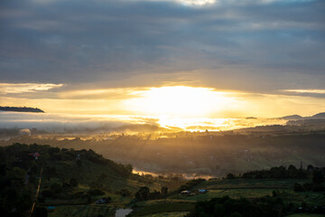 Beautiful natural view sunrise over mountain and hill.