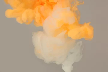 Gartenposter Abstract smoke background. Ink colors blot in water. Yellow, white, beige tone. © Liliia