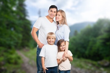 Happy young family walking together outdoor