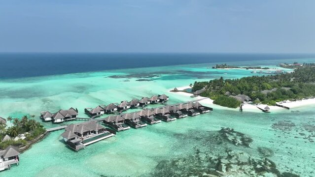 Aerial view, Asia, Maldives, North Male Atoll, Kuda Huraa, Four Season Maldives, with beaches and water bungalows, Asia