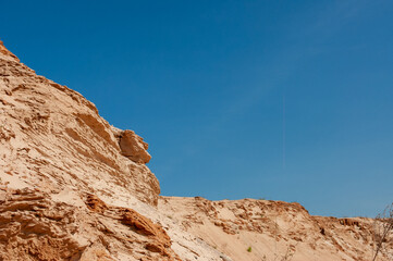 Obraz premium sand pit against the blue sky
