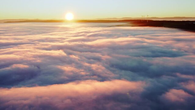 Drone view of sunrise with clouds over valley Remstal in autumn, region Swabian Forest, Baden-Wuerttemberg, Germany, Europe
