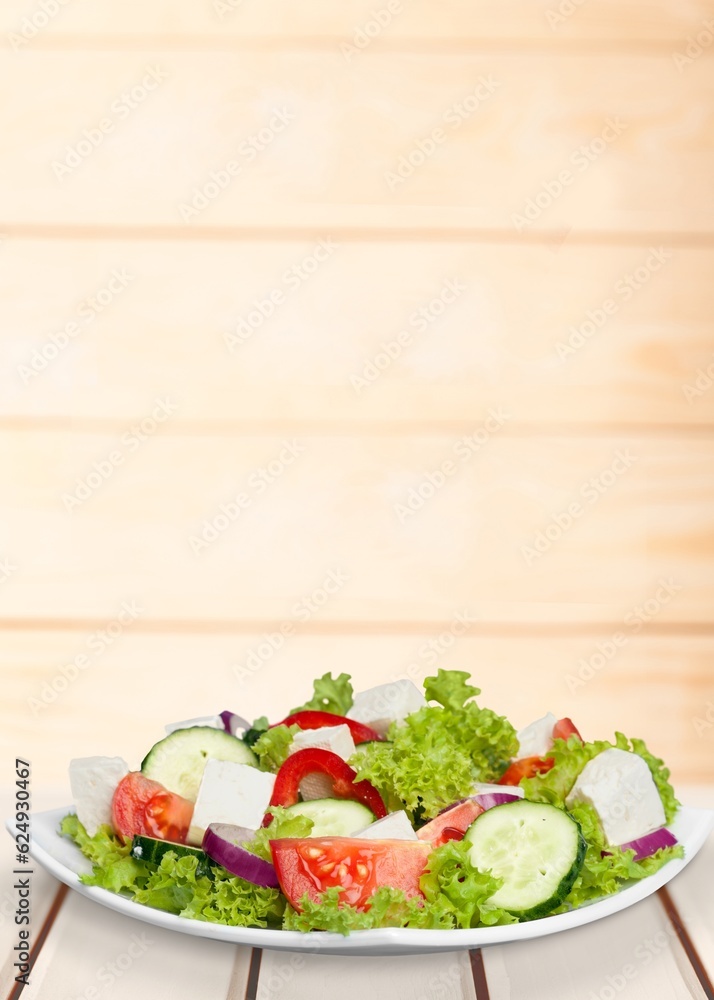 Wall mural Summer fresh tasty diet salad with vegetables