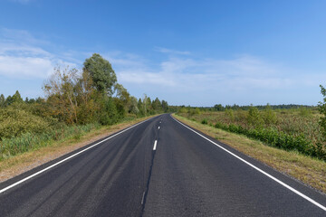 Fototapeta premium Narrow paved road for cars