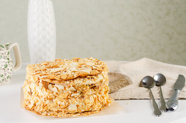 A piece of Napoleon cake. Layered cake with custard