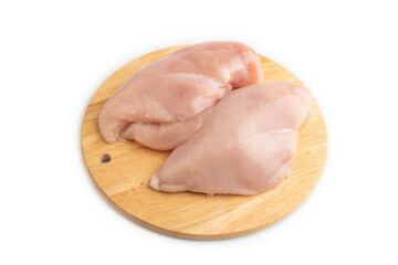 Raw chicken breast isolated on white background. Side view, close up.