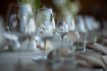 Beautiful wedding table decorations. Tablewear and bouquet of flowers.