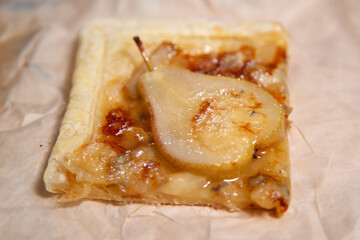 a piece of pear and gorgonzola pie.
