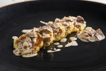 potato fritters with mushroom sauce 