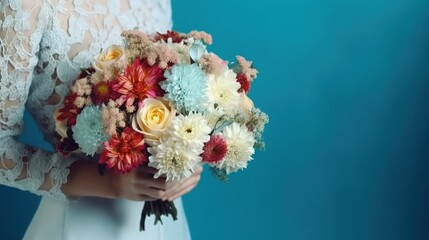 The bride in a dress holds a beautiful wedding bouquet. Beautiful bridal bouquet of the bride on the blue background. Wedding concept. Generative AI