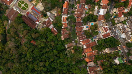 Aerial view of streets in the North Zone of Rio de Janeiro. Contrast of house, buildings and trees that make up the landscape of the wonderful city.