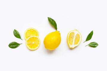 Fresh lemon with green leaves on white.