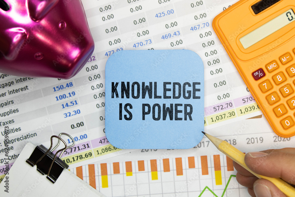 Poster concept:knowledge is power written on torn paper with black background and pen