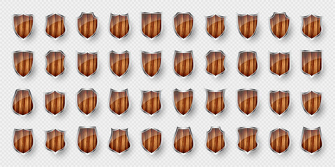 Set of wooden vintage shield icons. Black heraldic shields. Protection and security symbol, label. Vector illustration