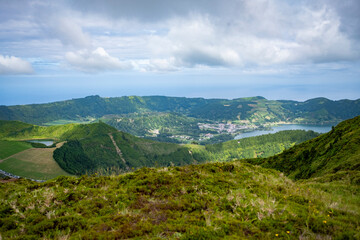 Fototapeta na wymiar Panoramic view of the lakes in Sete Cidades, from near the viewpoint Grota do Inferno. Grota do Inferno viewpoint at Sete Cidades on Sao Miguel Island, Azores, Portugal.