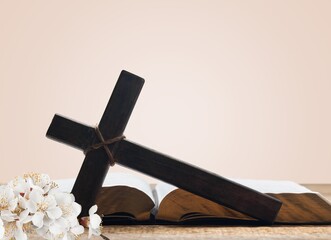 Religion wooden cross and bible book