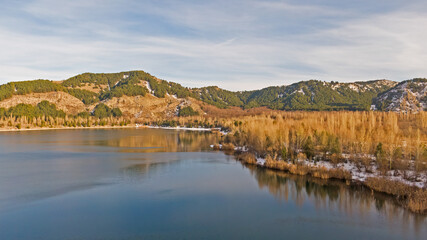 Reflection of trees in autumn in lake