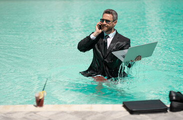 photo of business manager wearing suit work in summer pool, banner. business manager work