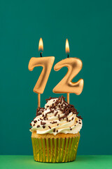 Birthday candle number 72 - Vertical anniversary card with green background