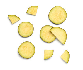 Slices of fresh eggplant on white background