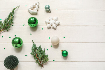 Fototapeta na wymiar Different Christmas decorations on white wooden background