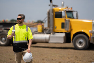 worker at coffee break with copy space, banner. male contractor at working location. contractor man at construction site. contractor observed the site of construction. contractor at the construction