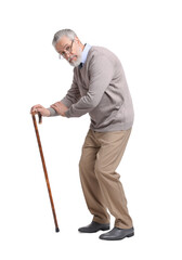 Stooped senior man with walking cane on white background