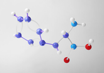 Molecule of phenylalanine on white background. Chemical model