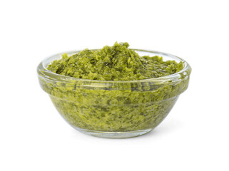 Delicious pesto sauce in bowl isolated on white