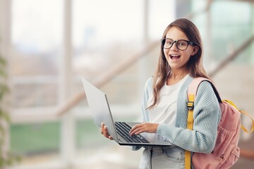 happy cute child study on laptop computer