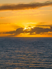 Sunrise and sunrays over the ocean