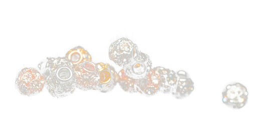 Fashion Silver gold bead ball with beautiful work detail is value. Luxury silver copper metal bead sequin ball is fashion trend and fly in air. Black background isolated selective focus blur