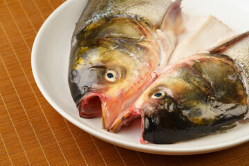Fresh chub head on chinese style background