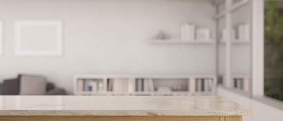 Copy space on an empty marble tabletop with a blurred, minimalist white living room as a background.