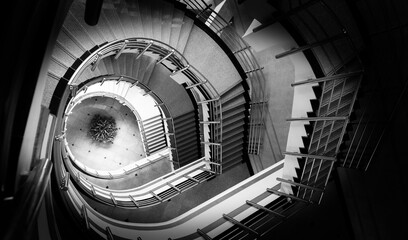 Spiral staircase in a building, looking from top