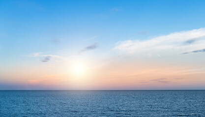 Naklejka na ściany i meble Blue sea and afternoon sky for background