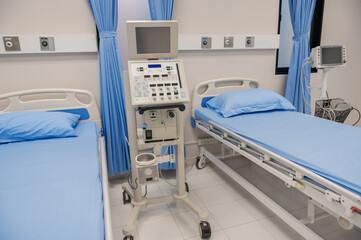 recovery rooms and beds with medical equipment in a hospital