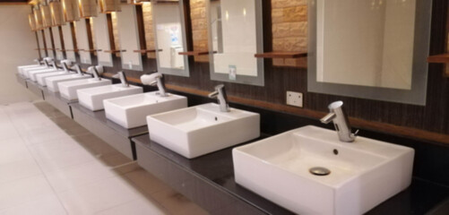 blur Hand wash basins and washbasins in a beautiful bathroom.