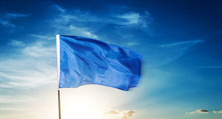 Blue flag waving on blue sky