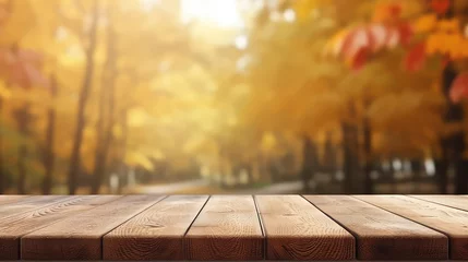 Foto op Canvas Empty wooden table space with autumn blur backround © AkhmadThamrin74