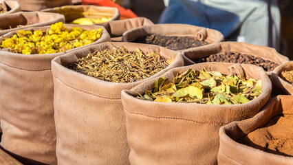 Bags of mixed spices and herbal tea in the street market. National cuisine and cooking concept. Bukhara, Uzbekistan