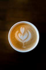 Latte on table paper cup