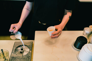 Latte art being poured