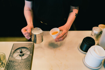 Latte art being poured
