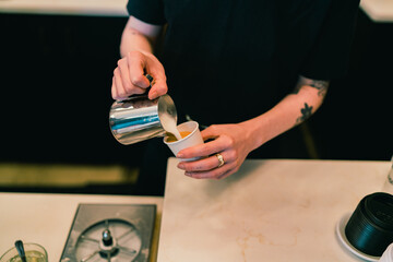 Latte art being poured