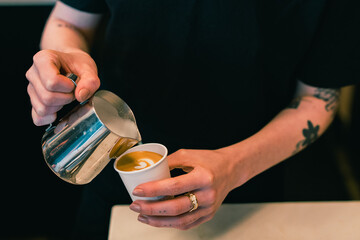Latte art being poured
