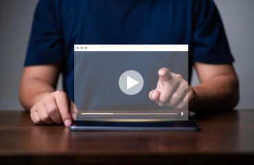 multimedia player and online streaming concept, man watching online show or tutorial on video streaming website,music video.