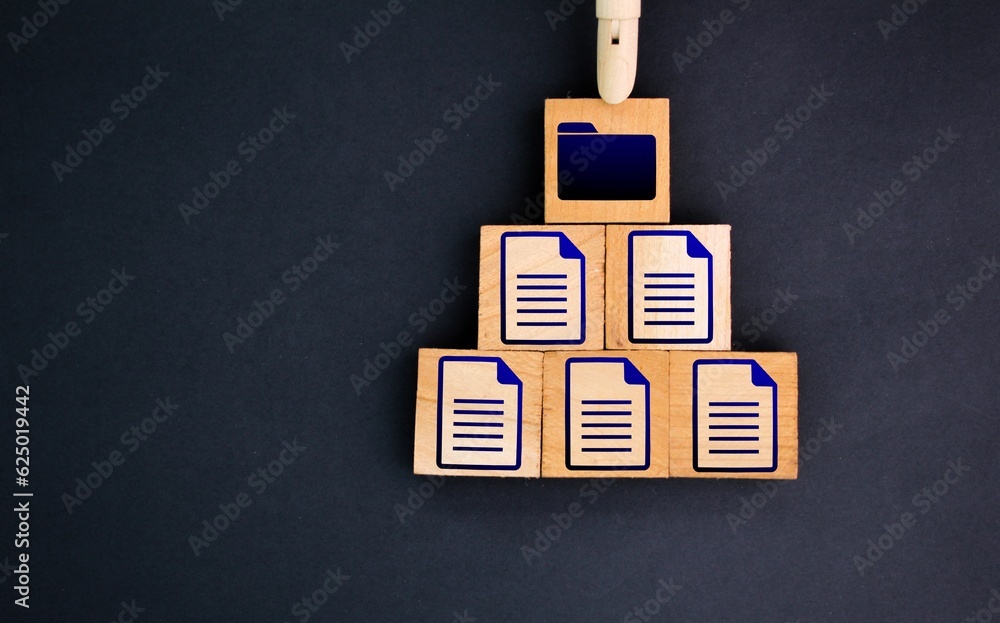 Poster file icons are arranged into folders. concept document management system or dms.