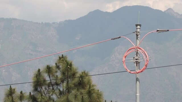 Overhead optical fiber cable in rural village areas